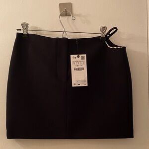Black mini skirt by Zara with rhinestones accent